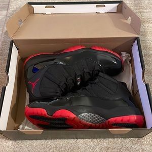 Never worn Jordan Bred 11’s, size 10. Custom black midsole.